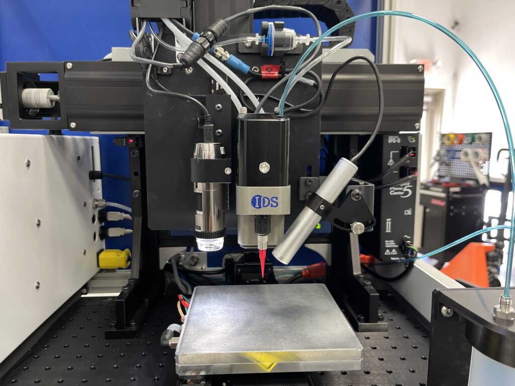 Picture of the NanoJet Gen2 Desktop work area including process camera, alignment camera, printhead, and 150 mm heated vacuum platen