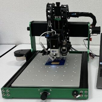 Picture of Gen2 printhead integrated onto 3-axis Anolex CNC platform