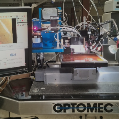 Picture of NanoJet Gen2 printhead retrofitted onto an Optomec motion platform